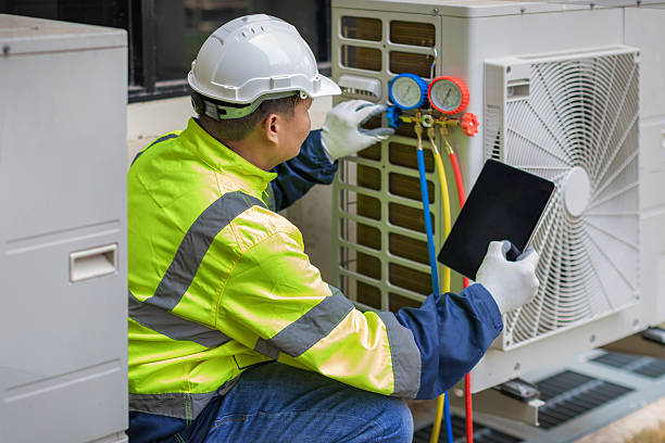 Professional Hvac Repair technician working in Champaign, IL